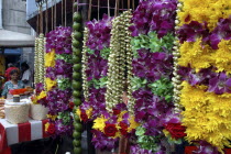Row of hanging flower garlands ouside an Indian Temple