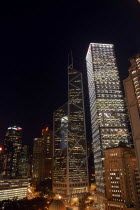 Cityscape with illuminated skyscrapers at night