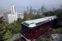Hillside cable car carriage overlooking the cityscape below