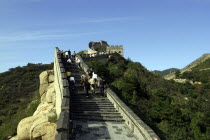 View along a section of the wall with tourists walking up steps