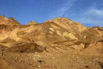 View over layered sculpted rock hills in the golden afternoon sun