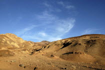 View toward layered sculpted rock hills