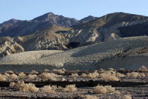 View over the desert landscape toward rocky moutainous horizon