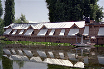 Nagin Lake. Large modern houseboat with window shades