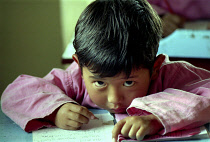 Young Tibetan refugee child in class