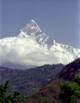 White peak of Mount Machhapuchare viewed from Lake Pokhara