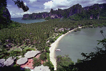 Aerial view over Rai Ley beach with palm covered land strip