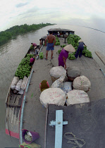 Transporting fresh produce along the Mekong River