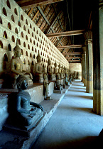 View along row of seated Buddha statues at Wat Si Saket