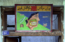 Dentist sign showing illustrated pictures of teeth