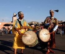Two drummers standing in the market place