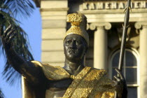 Honolulu. King Kamehameha statue wearing gold hat and holding a staff
