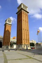Placa d Espanya. Angled view of the two 154ft high brick campaniles by Ramon Raventos.