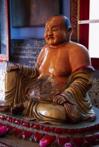 Wat Chayamangkalaram.  Interior with laughing Buddha figure.