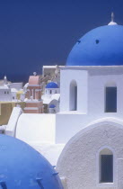 Architectural detail of blue and white painted churches.