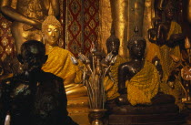 Wat Chedi Luang. Group of various Buddha statues in the main temple hallAsian Prathet Thai Raja Anachakra Thai Religion Siam Southeast Asia Religious Siamese