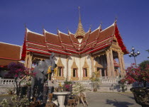 Buddhist Temple with elephant statue in the foreground