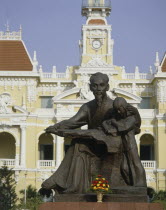 Bronze statue of Ho Chi Minh outside the town hall Hotel de Ville in old Saigon