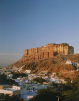 Meherangarh Fort on the hilltop overlooking the town in the afternoon sun