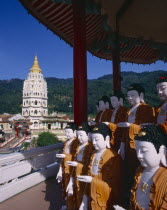 Kek Lok Si Temple with rows of buddha statues in foreground