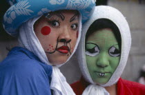 Harajuku District. Portrait of two girls wearing face paint