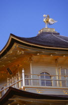 Kinkaku Ji Temple aka the Golden Pavilion. Section of the gold leaf covered structure and rooftop bronze phoenixAsia Asian Japanese Nihon Nippon Religion Pavillion Religious