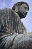 Angled view looking up at the Daibutsu aka Great Buddha statue dating from 1252