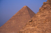 Section of pyramids against a blue sky