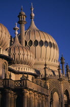 Brighton Pavilion exterior section showing onion domes in evening lightEuropean Great Britain Northern Europe UK United Kingdom Warm Light British Isles Pavillion