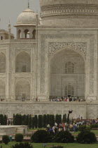 A section of the white marble Taj Mahal exterior section including the entrance  garden  and dome