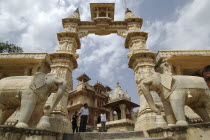 Shri Jagat Siromaniji Temaple made of whilte marble and ornately with elephant statues either side of the entrance stair