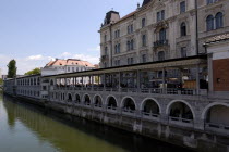 River Ljubljanica. View along embankment and colonnade designed by Joze Plecnik
