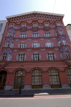 Angled view looking up at the Art Nouveau facade of the Cooperative Bank designed by Ivan Vurnik and decorated by his wife Helena Vurnik in 1922