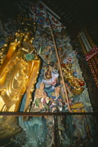 Golden statuary inside Huating Temple.