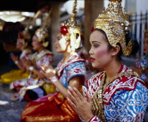 Erawan Shrine. Dancers performing for devotees who give thanks for good luck received