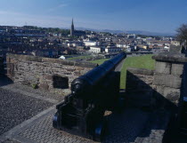 General view over the city from the city walls toward the Bogside with cannon in the foreground