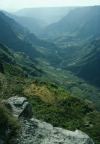 View from Dese towards Wegel Tena Woilo Provinceover mountains into green valley.