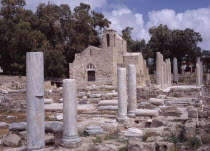 Twelth century Byzantine church.  Part restored exterior in area of fallen masonry and ruined remains of standing columns.