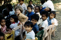 Mixed race group of children in nursery school.