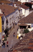 General view over cobbled street and rooftops