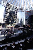 Potsdamer Platz. Sony complex interior with crowds gathered around central water fountain