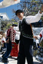 Langada. Boy in costume performing traditional Greek dancing