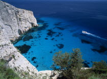 New Blue caves near the Skinari headland with tourist boat