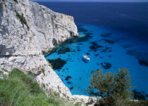 New Blue caves near the Skinari headland with tourist boat