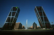 Paseo de La Castellana. Puerta de Europa office complex at entrance to business district.  Two modern towers  the worlds first leaning high rise building completed in 1996
