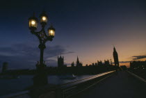 The Houses of Parliament at sunset seen across Westminster Bridge