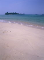 Lonley Beach  Aow Bai Lan. View out toward small island from sandy shore.