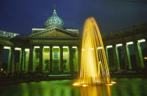 Kazan Cathedral  exterior facade and fountain in foreground illuminated at night.