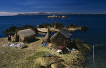 Lake Titicaca.  Reed houses on floating islands built by the Uros people.