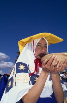 Young woman in traditional costume at Inti Raymi. Cuzco